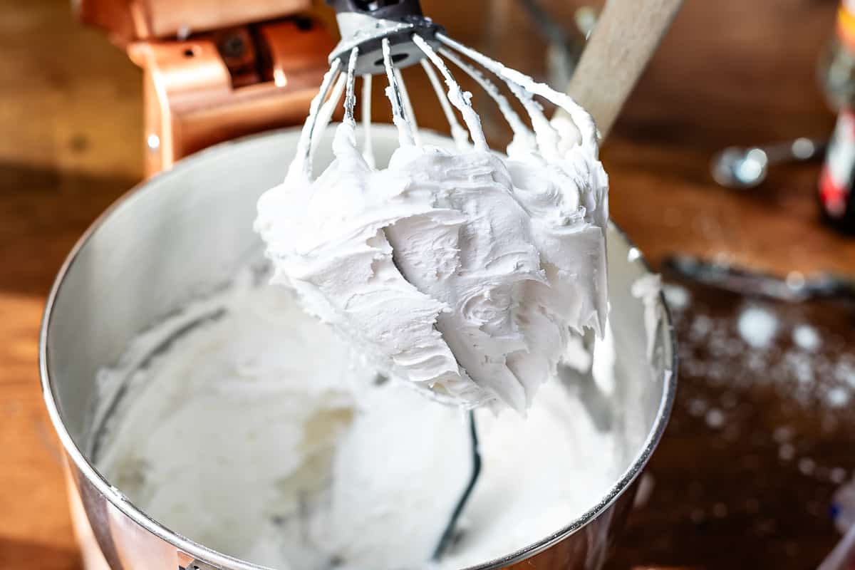 icing on whisk that looks really thick, almost like cement.