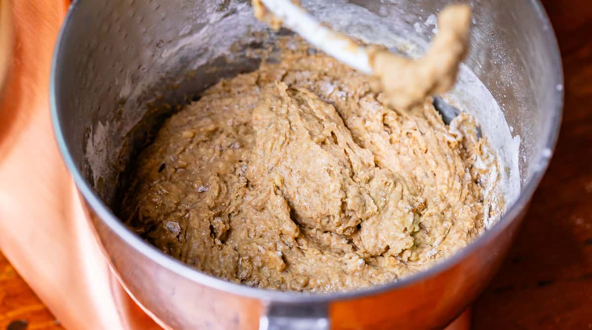 wet and sticky dough in mixer, more sticky than you're used to with wheat flour is normal.