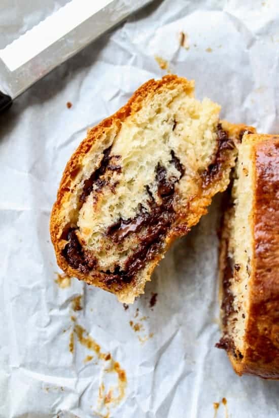 chocolate babka in a slice cut from a loaf. 