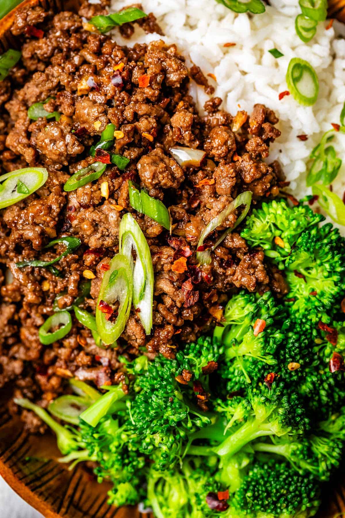 broccoli, rice, and Korean beef served together in a ceramic bowl.