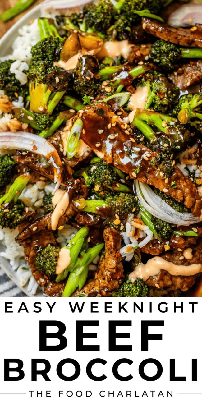 beef with broccoli on a plate with rice, shallots, and sriracha mayo.