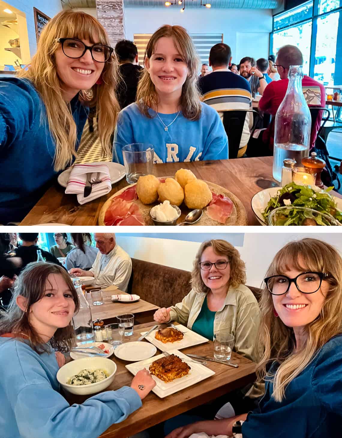Mom and daughter eating food at a restaurant.
