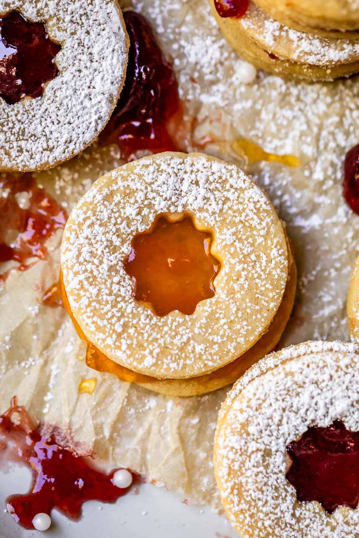 linzer cookie with star cutout and filled with sunshine-y apricot jam.