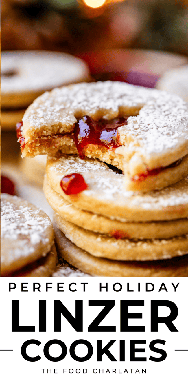 bite taken out of jam filled linzer cookies.