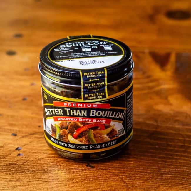 Better than bouillon beef base on wooden table.