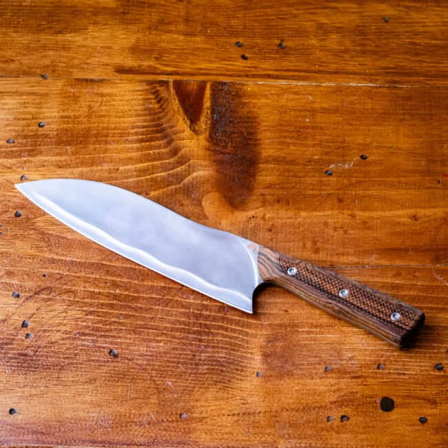 Custom made chef's knife with wooden handle.