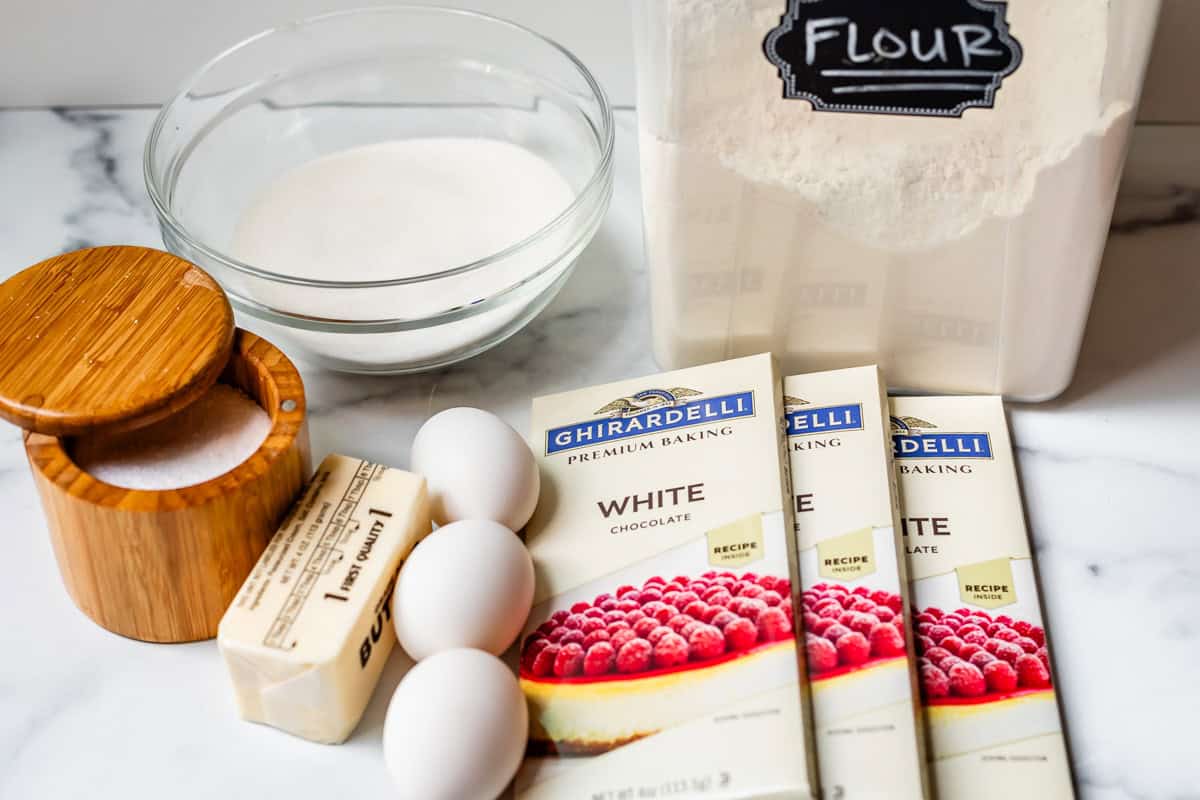 ingredients like white chocolate, eggs, flour, butter, and more for the brownies.