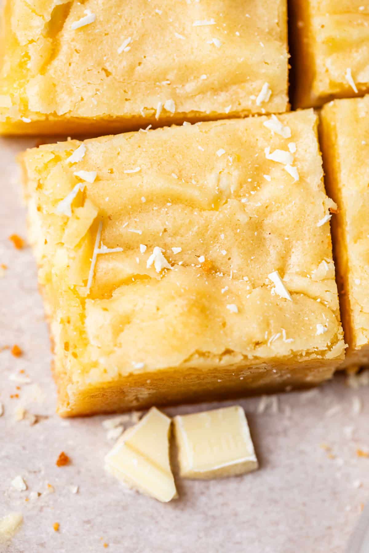 looking down on white chocolate brownies that are cut into squares.