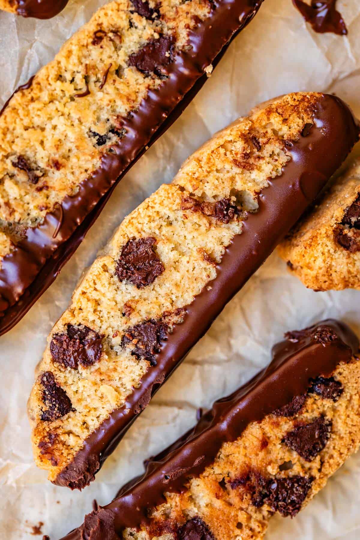 biscotti cookies with the thin bottom edges dipped in chocolate.