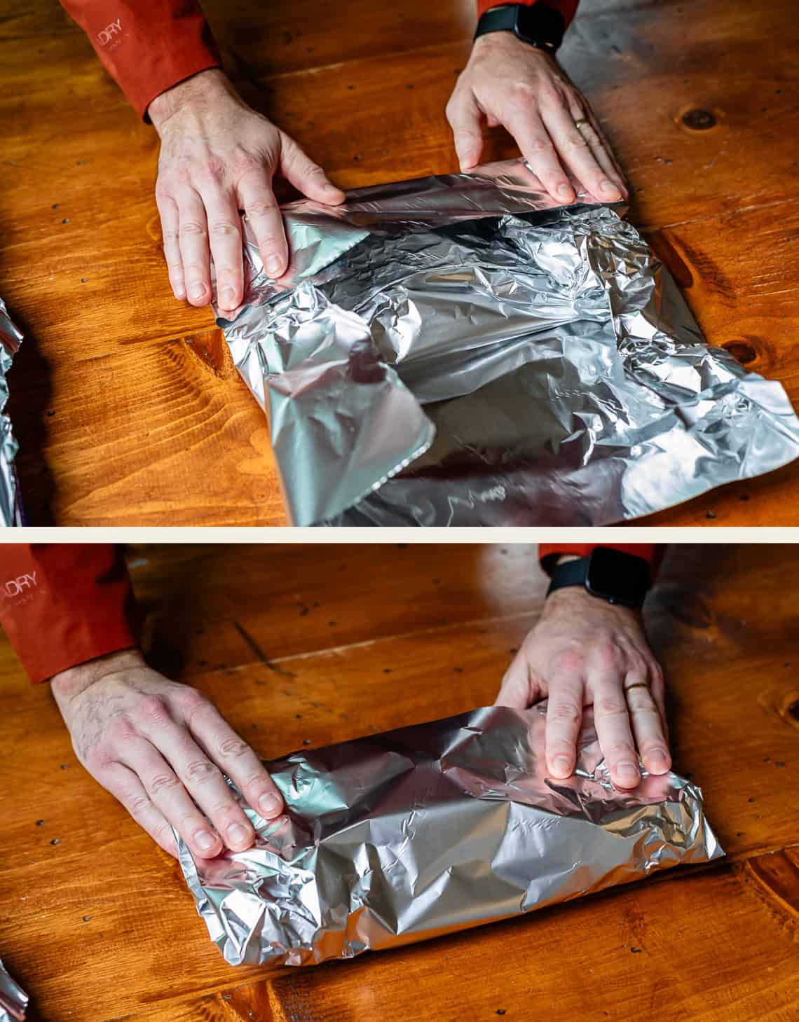 hands folding aluminum foil around hickory wood chips to make a smoking pouch.