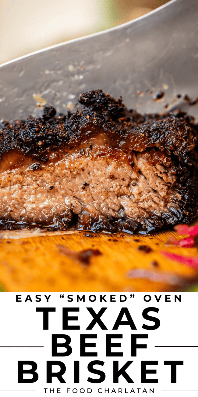 knife slicing into charred brisket.