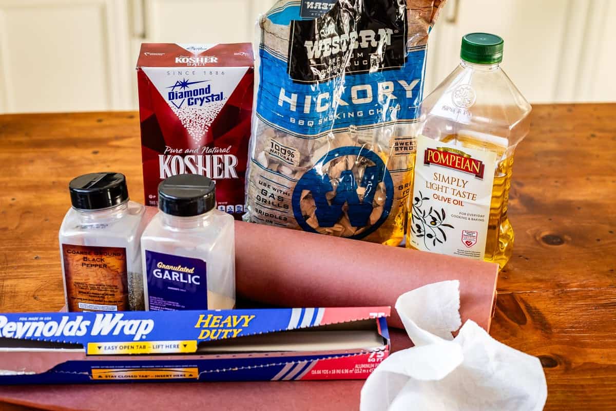 ingredients and tools to help make brisket like wood chips, butchers paper, etc.