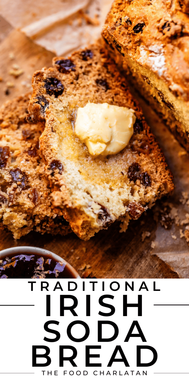 traditional irish soda bread with raisins and a pat of butter.
