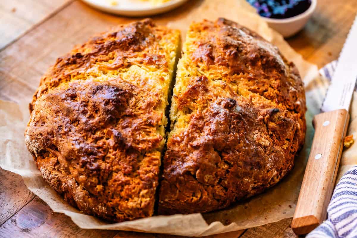 Large round loaf of Irish soda bread but in two halves.