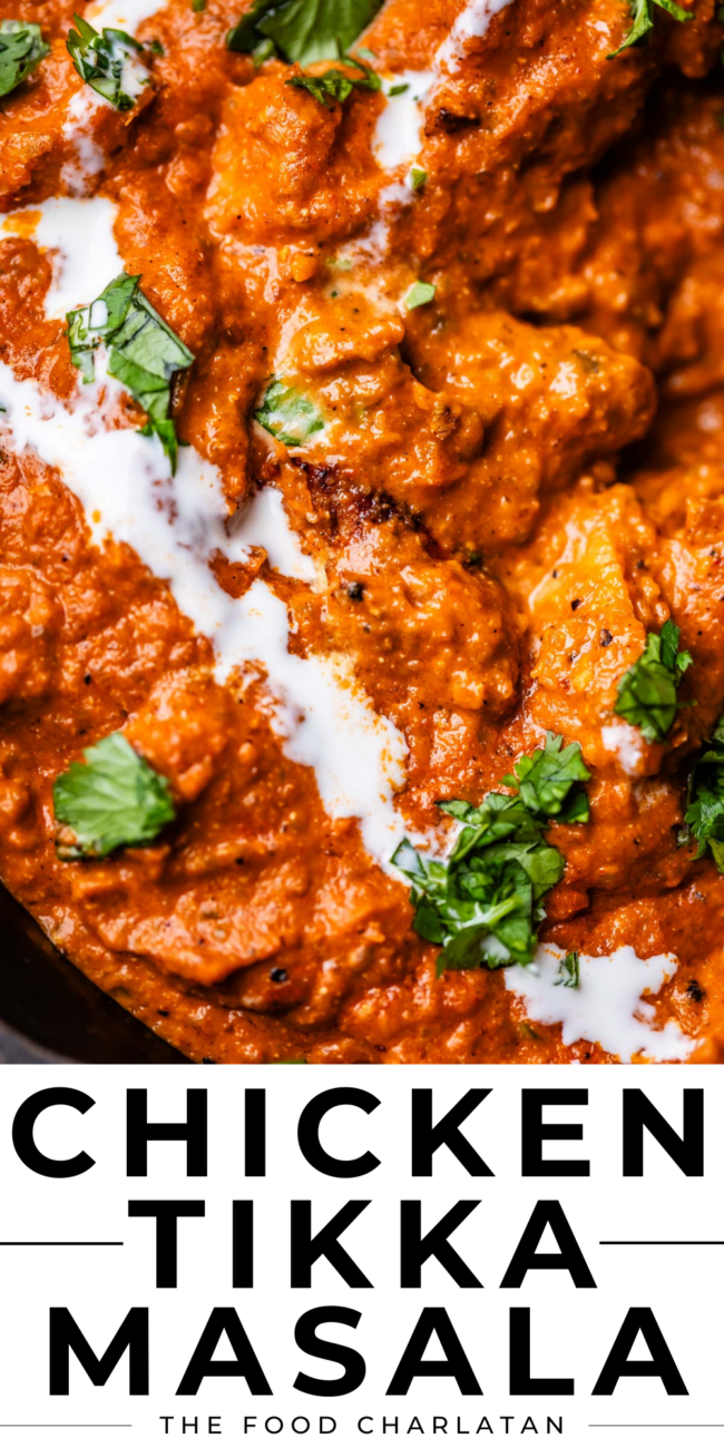 close up of chicken tikka masala with cream drizzled on top.