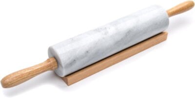 A marble rolling pin with wooden handles.