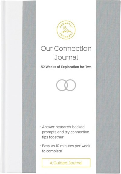 Front cover of Our Connection Journal: 52 Weeks of Exploration for Two by Promptly Journals, featuring a minimalist white and gray design with yellow accents and brief description text.