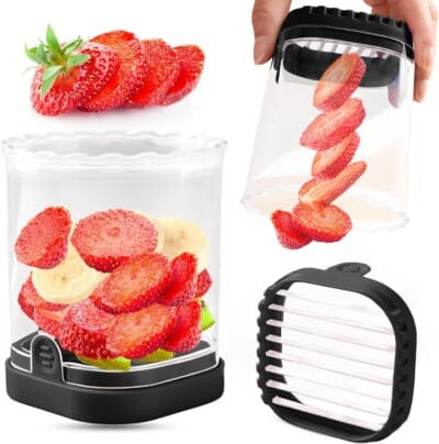A hand presses a slicer filled with strawberry slices over a container with sliced strawberries, bananas, and a few green pieces. The slicer’s black lid and grid are also shown separately.